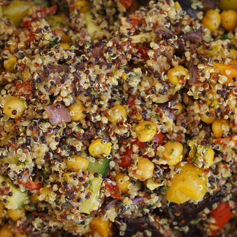 Close-up of a colorful quinoa salad with various vegetables
